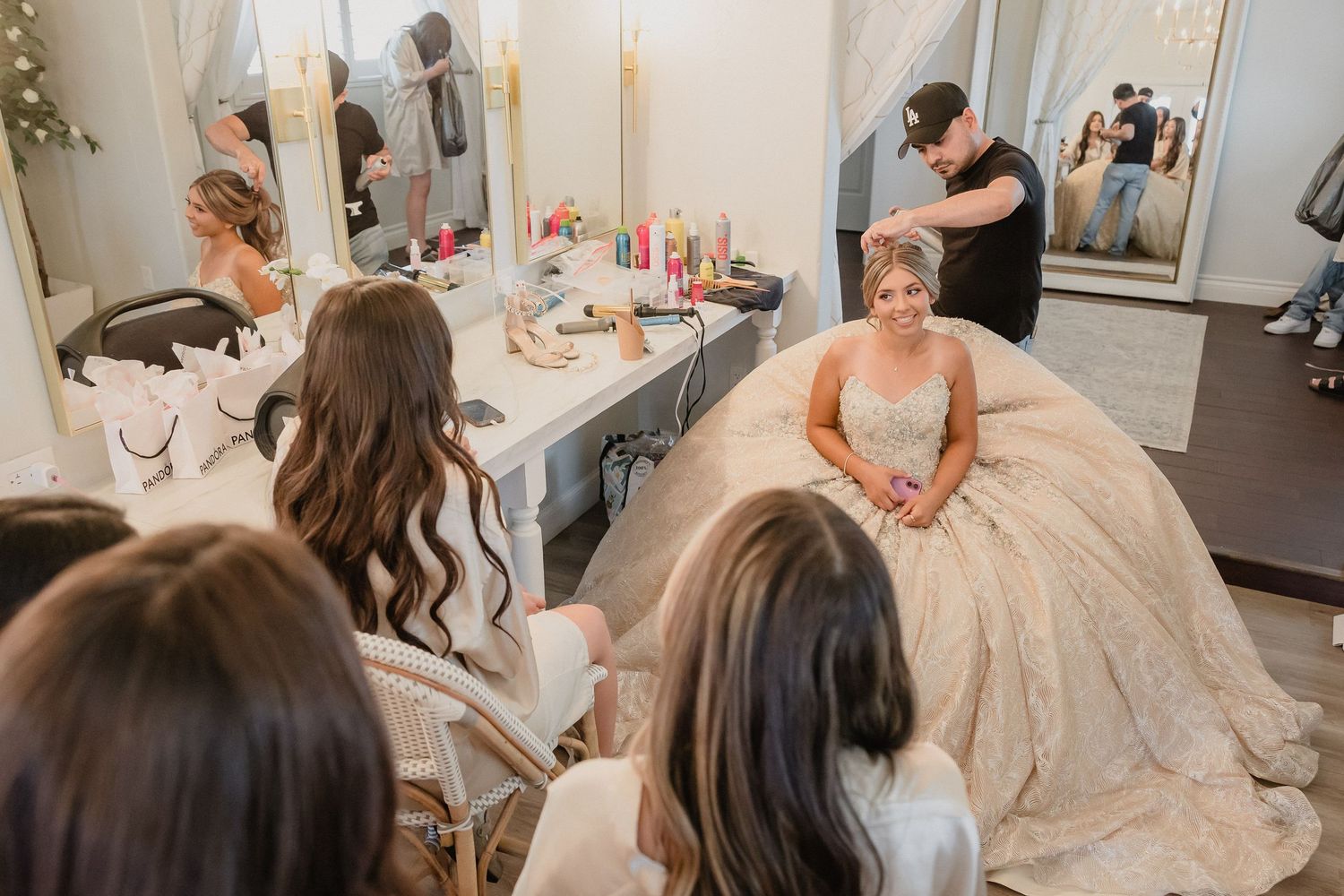Quinceanera and her damas get ready in hair and makeup for Bella Vista quince celebration