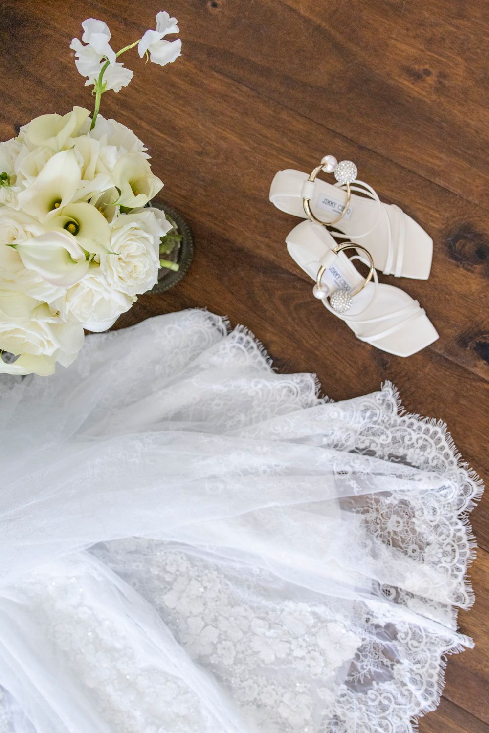 Bride adjusting veil before ceremony, expressive true-to-life photography, San Antonio wedding