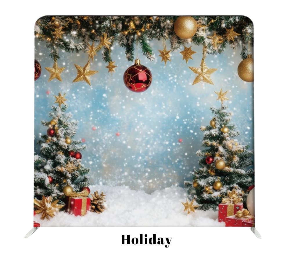 Festive Christmas scene with snowy backdrop, decorated evergreen trees, golden stars, and red and gold ornaments against blue sky.