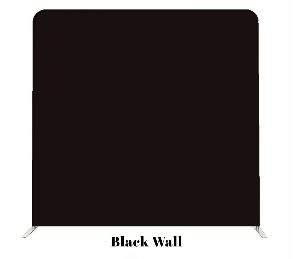 A solid black backdrop wall or photo booth background mounted on a sturdy metal frame stand.