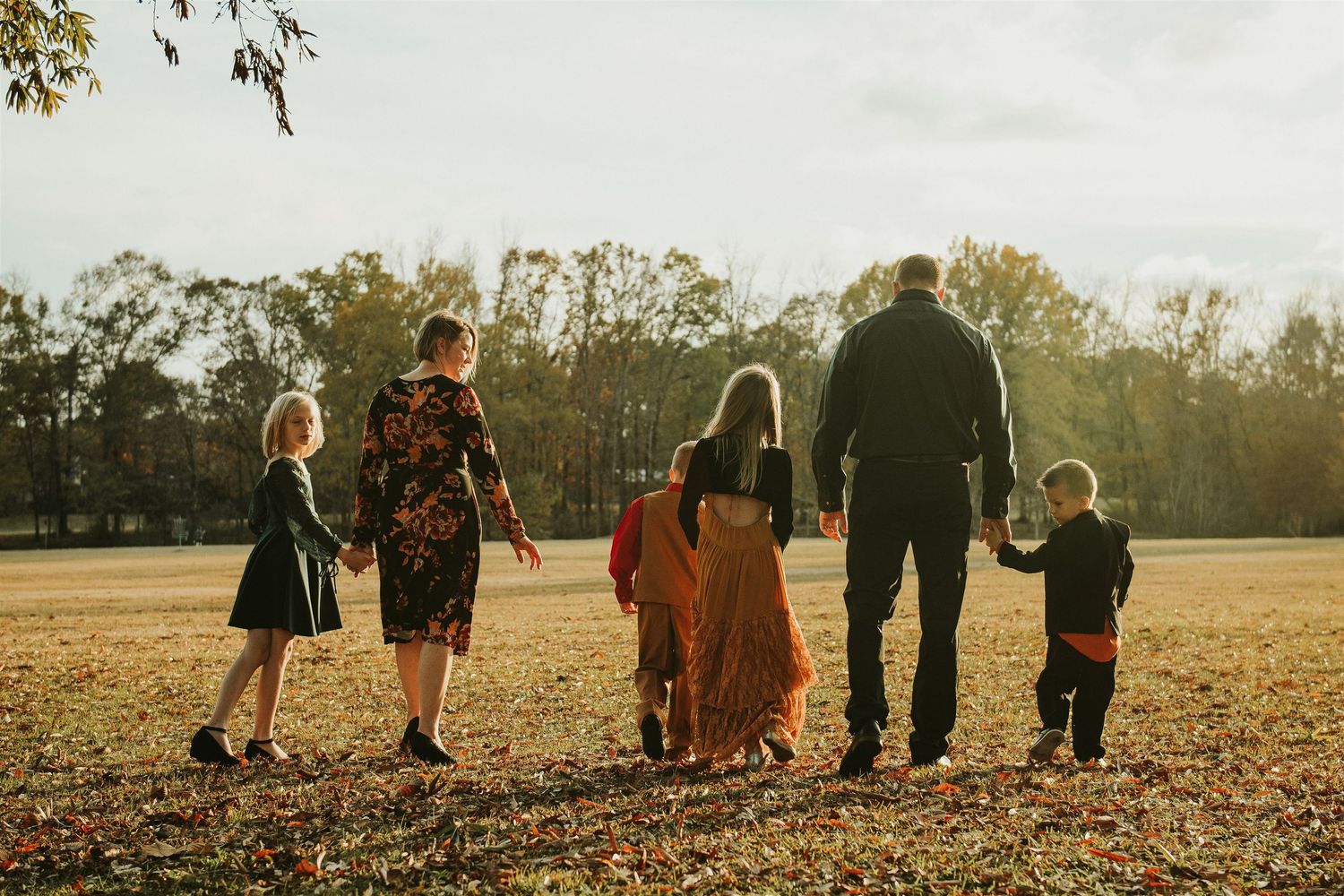 outdoor family portrait, family walking portrait, family portrait session 2025.