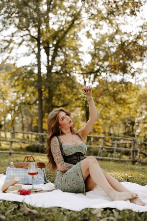 Autumn picnic setting with vintage aesthetic and floral decorative elements.