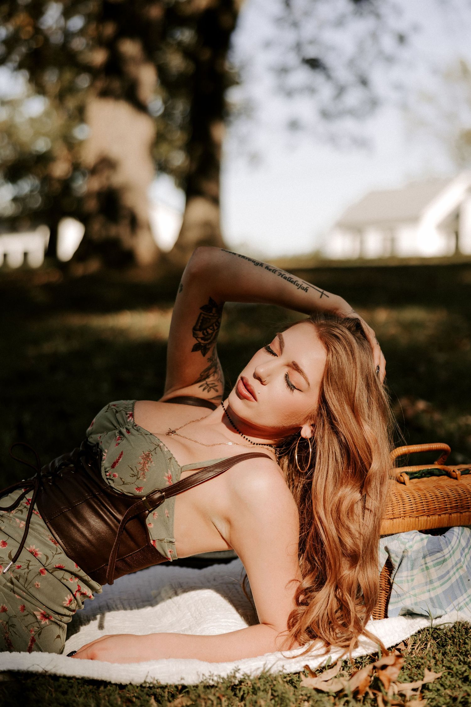 Intimate outdoor portrait with dramatic shadows and natural lighting.