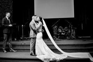 Black and white wedding ceremony photos showing couple exchanging vows.