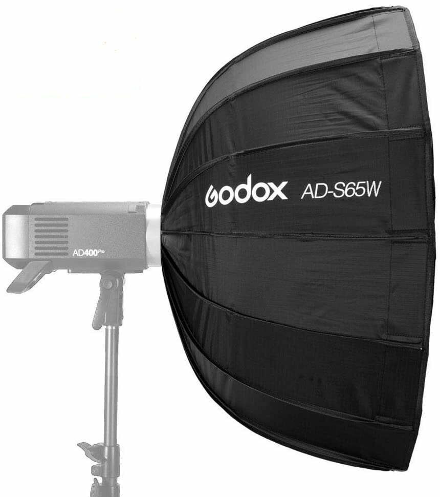 Godox AD-S65W black parabolic softbox modifier mounted on a light stand for professional studio photography.