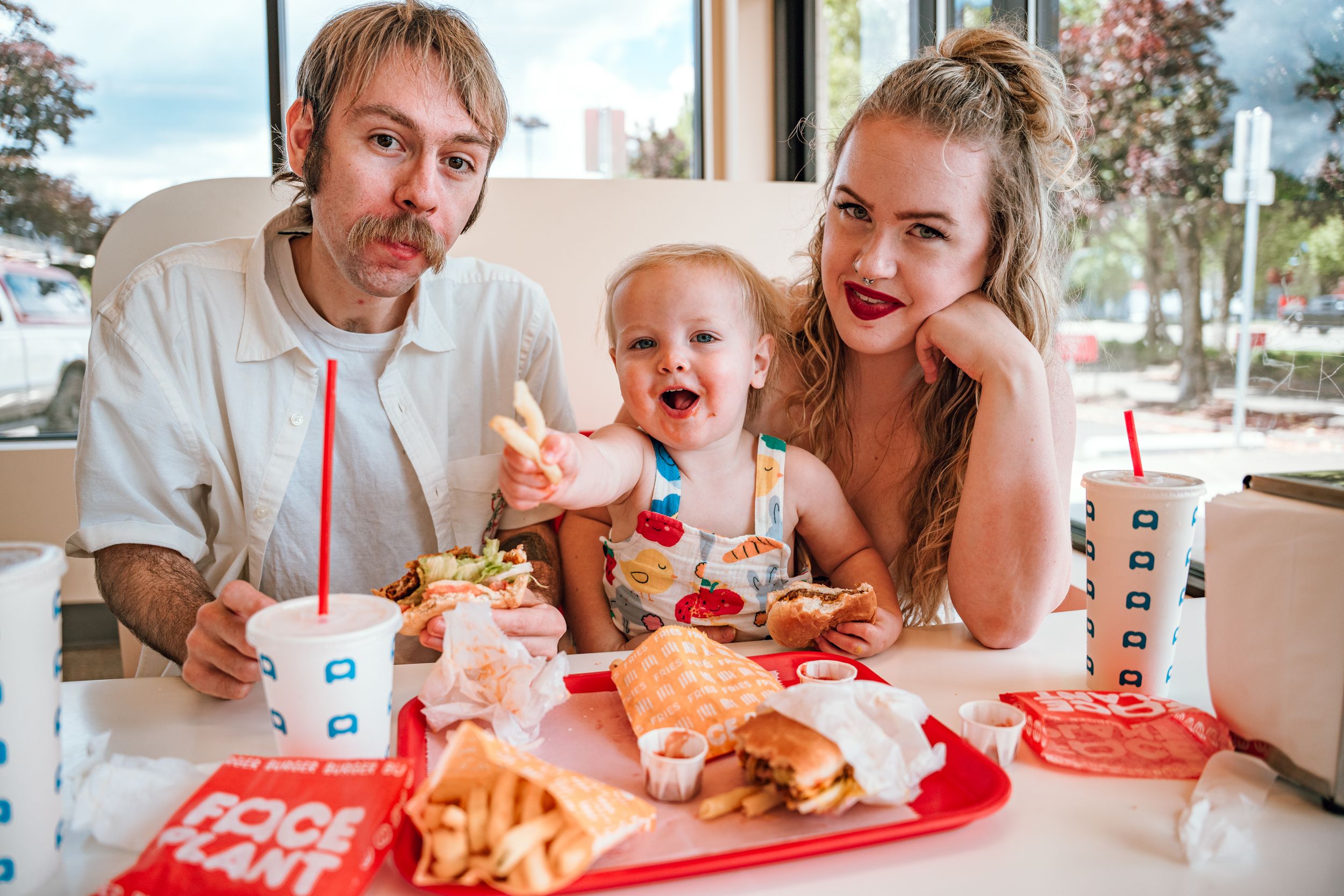 a family portrait at a burger joint in Portland Oregon