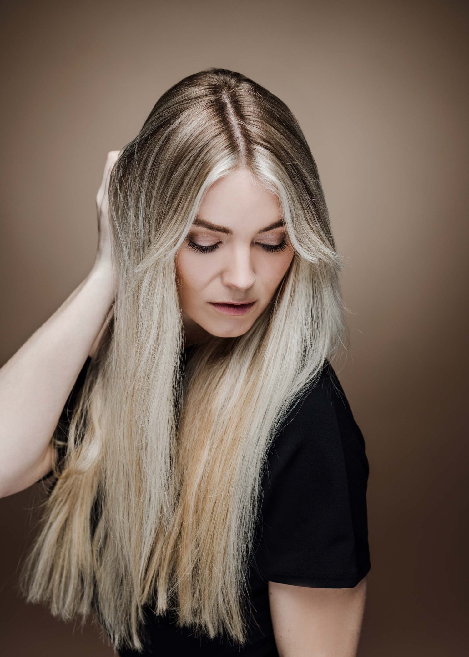 Blonde hair transformation shown in multiple angles displaying sleek straight styling and natural movement.