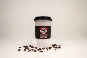 Minimalist product shot of black coffee cups with Firehouse Coffee branding.