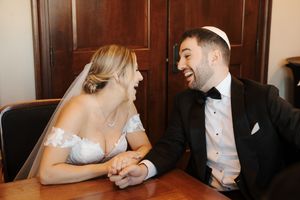 A sequence of five wedding photos showing tender moments between a bride and groom at their reception.