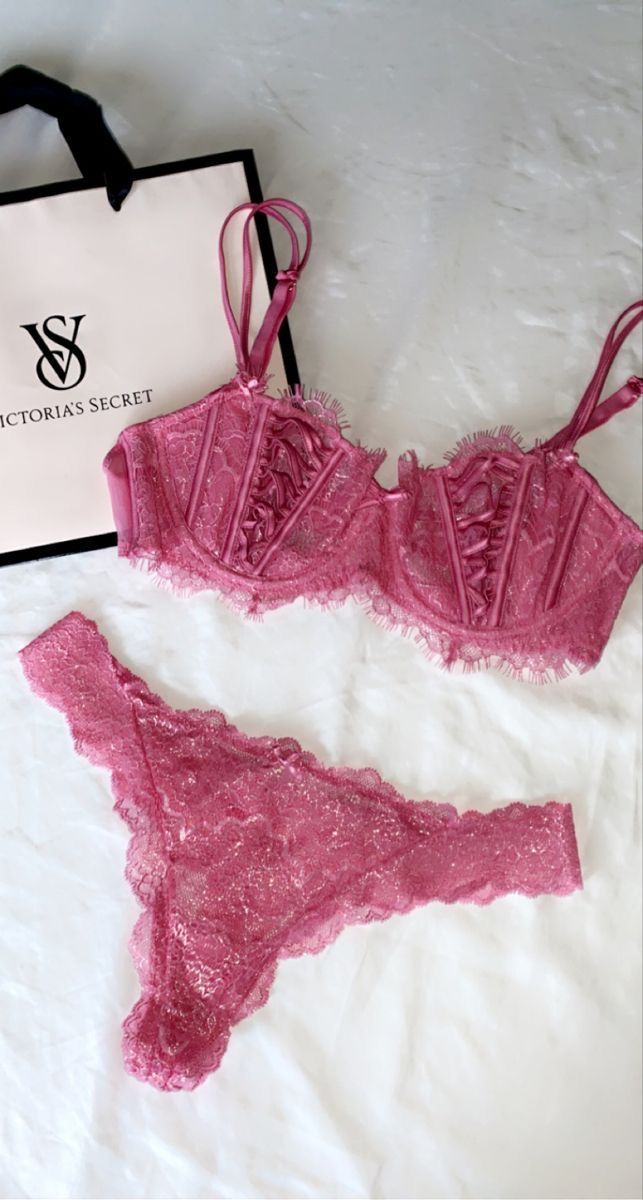 Pink lace lingerie set from Victoria's Secret featuring delicate floral details and adjustable straps.