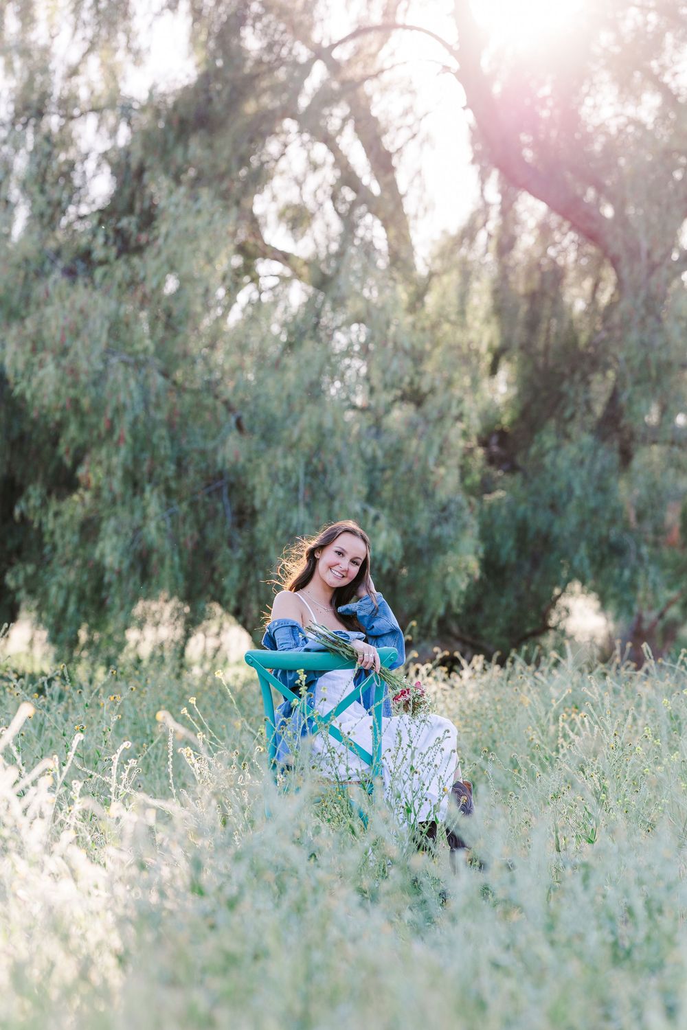 Outdoor senior photos in Simi Valley open field at golden hour
