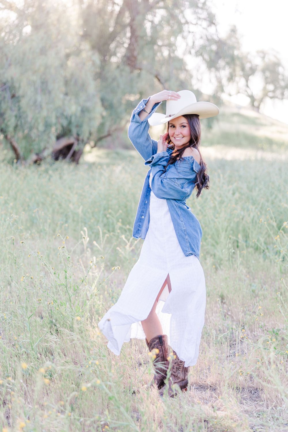 Outdoor senior photos in Simi Valley open field at golden hour