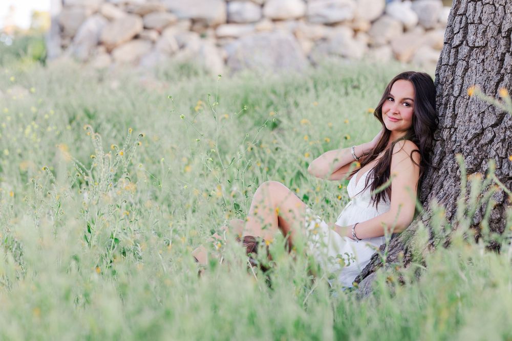 Outdoor senior photos in Simi Valley open field at golden hour