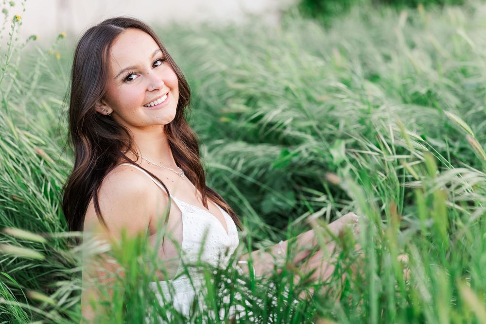 Outdoor senior photos in Simi Valley open field at golden hour