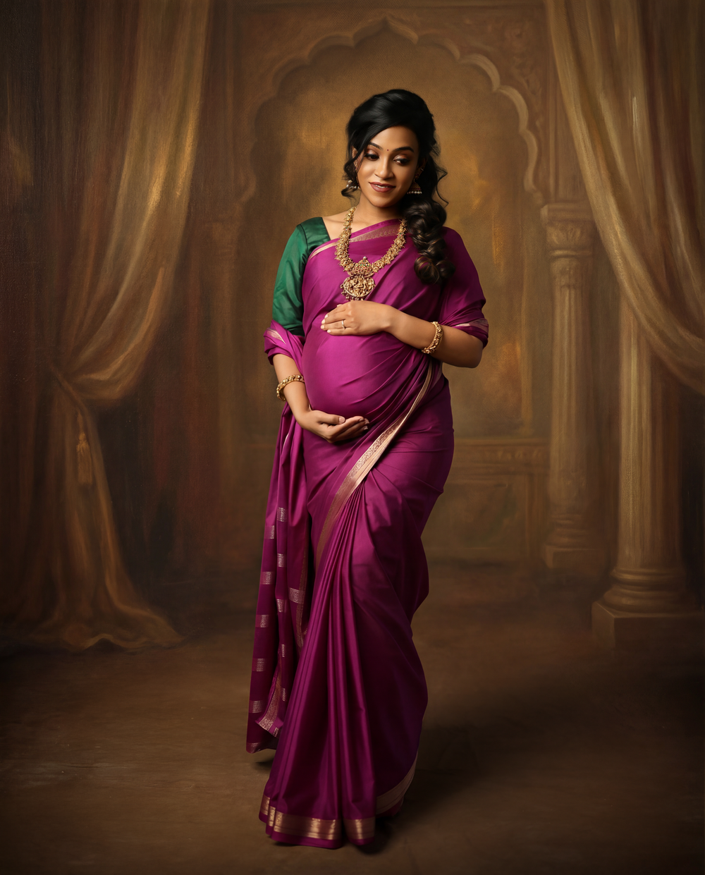 Woman in a purple silk sari with gold border poses elegantly against a dark studio backdrop.