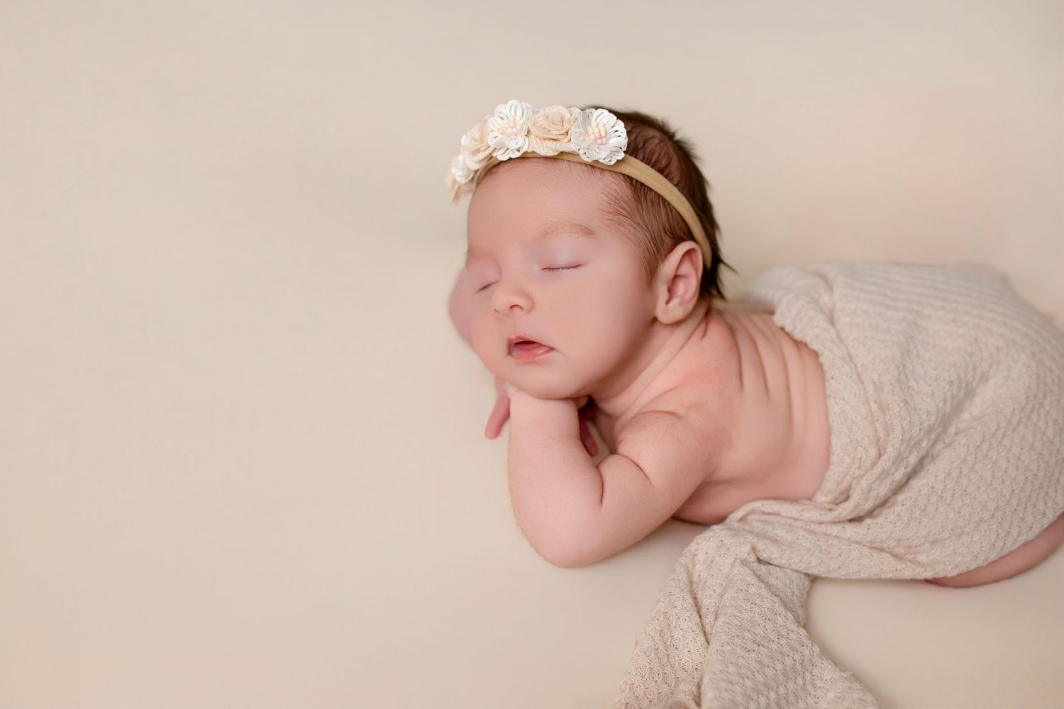 Sweet newborn portrait with soft lighting