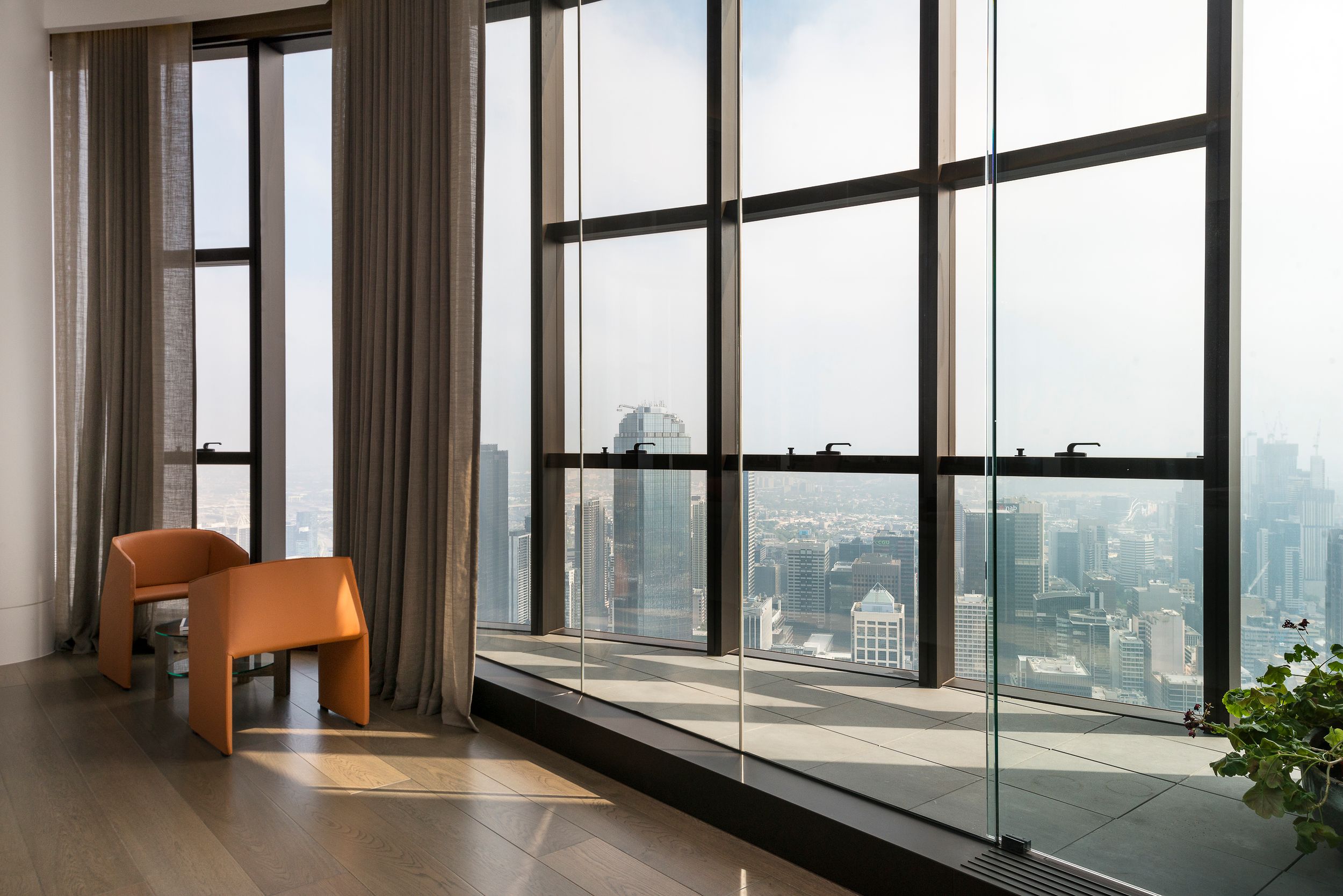 Interiors photography,  view to Melbourne from garden room in a penthouse