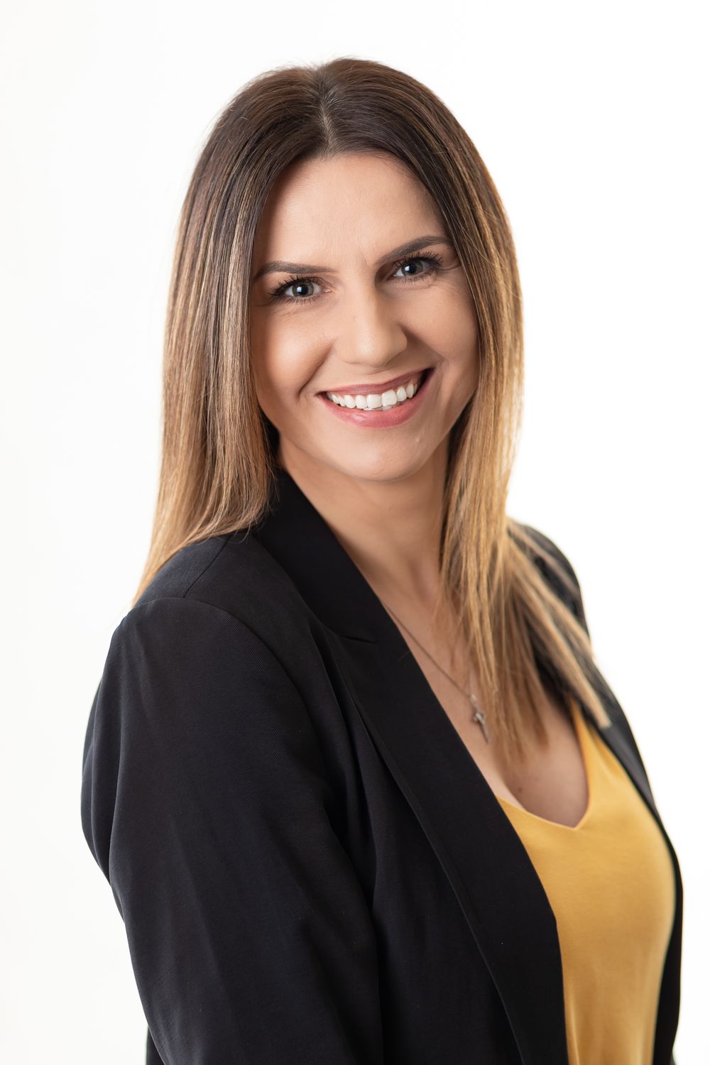 Series of professional headshots featuring business attire against white background.