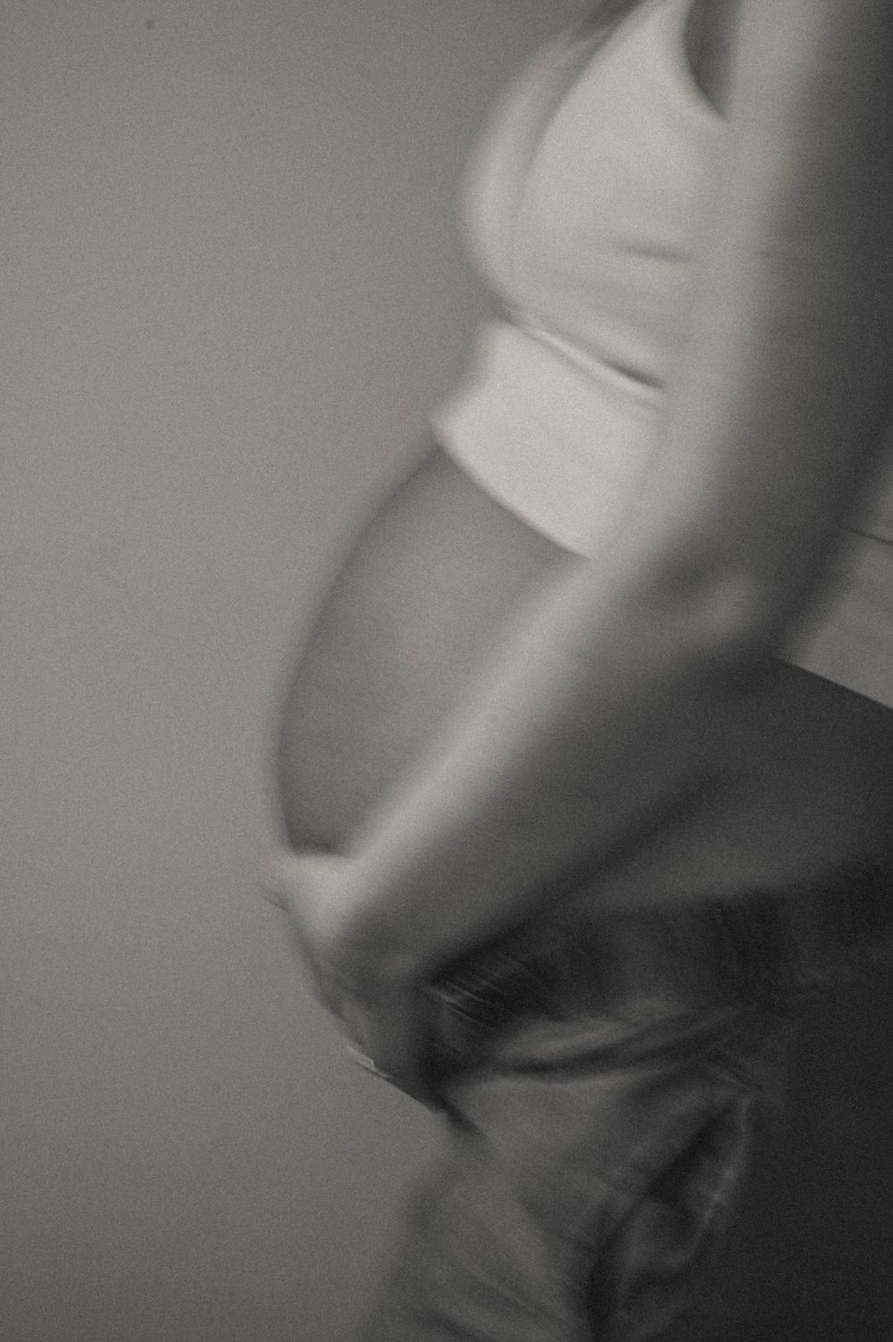 Abstract black and white motion blur sequence showing movement and form.