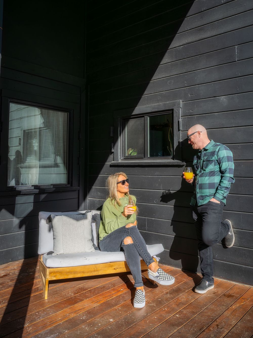 Couple enjoying mimosas in the sun on the patio by Denver Hospitality, Travel & Tourism photographer Captain Colorado Photography.
