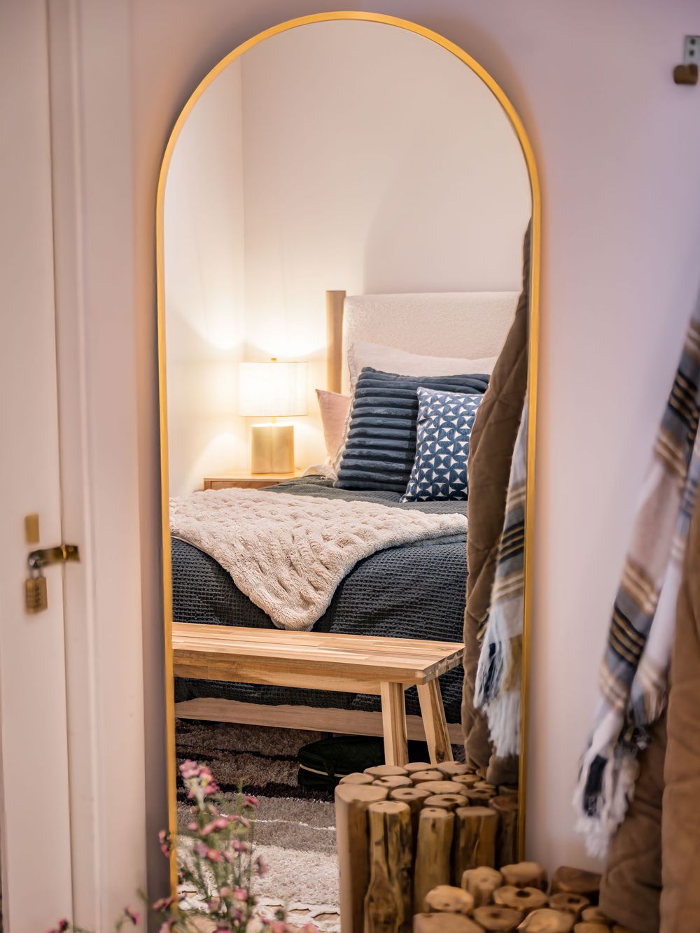 Detailed shot of a reflection of a bed in a mirror by Denver Hospitality, Travel & Tourism photographer Captain Colorado Photography.