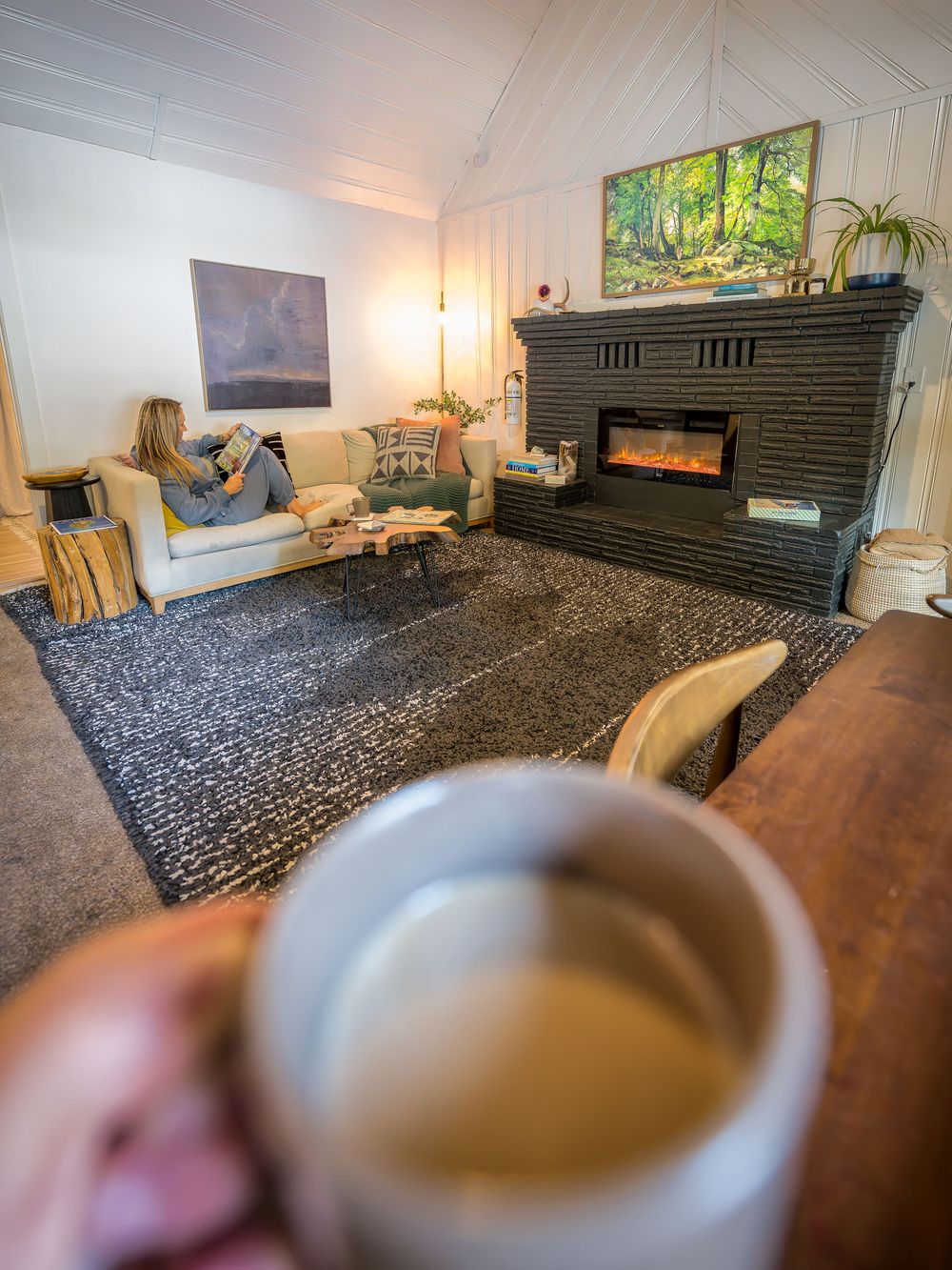 Couple enjoying coffee in the living room by Denver Hospitality, Travel & Tourism photographer Captain Colorado Photography.