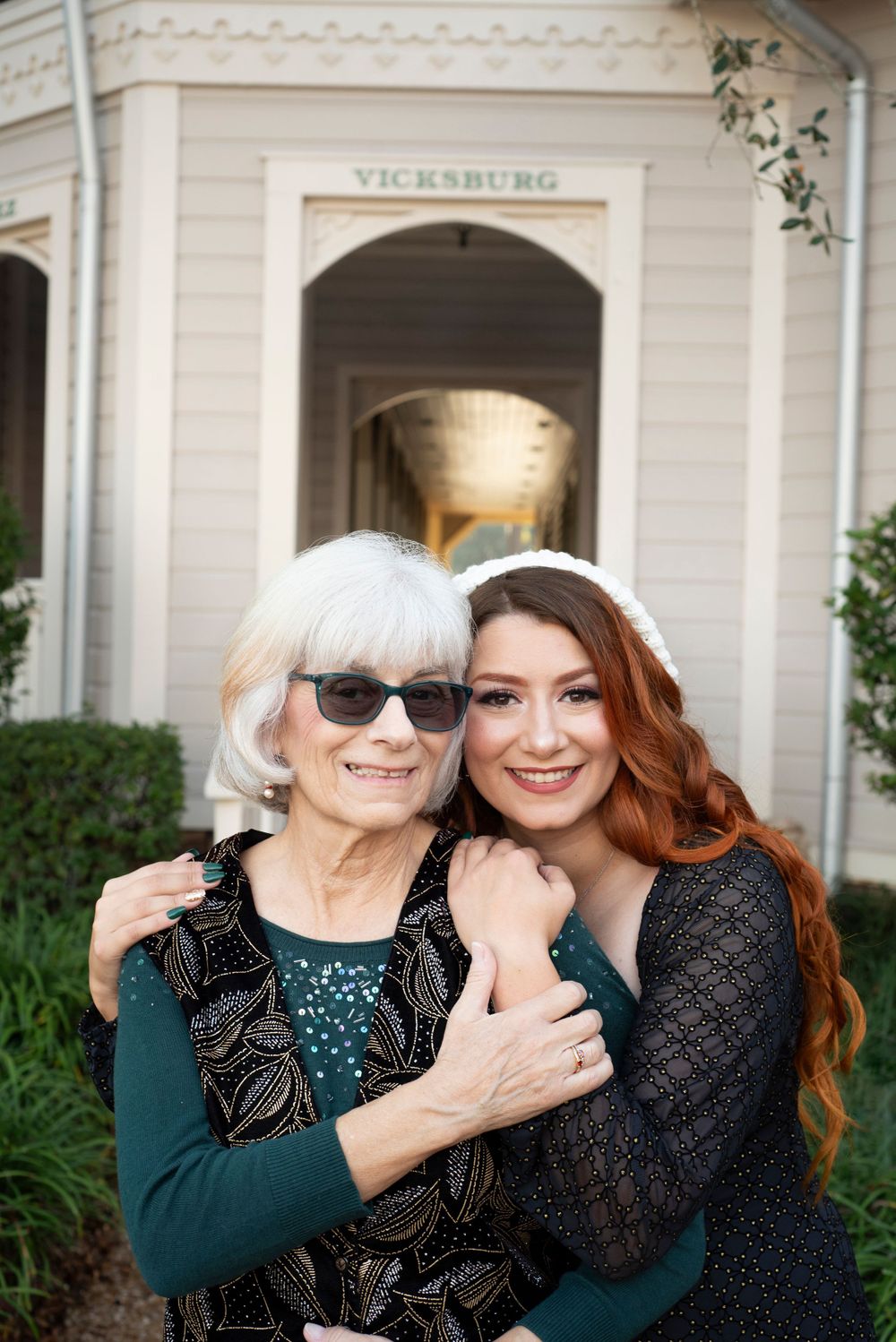 Mom and daughter with pet Christmas family photo session at Disney Port Orleans Riverside resort in Orlando Florida