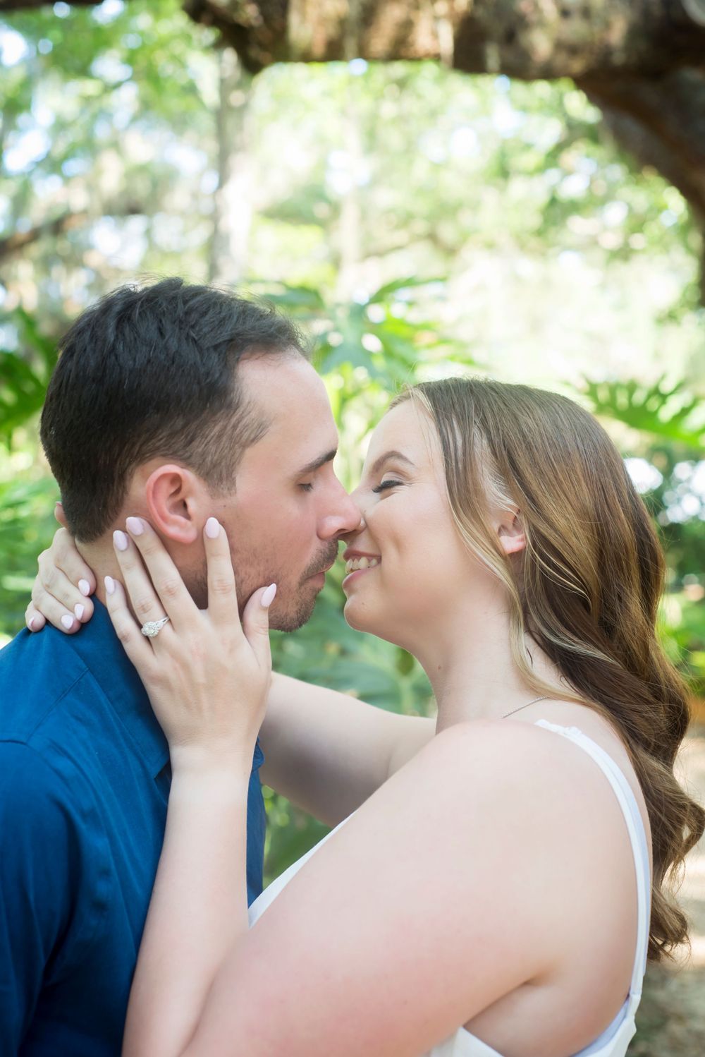Duo engagement portrait session at Washington Oaks Garden. Natural lighting soft and elegant