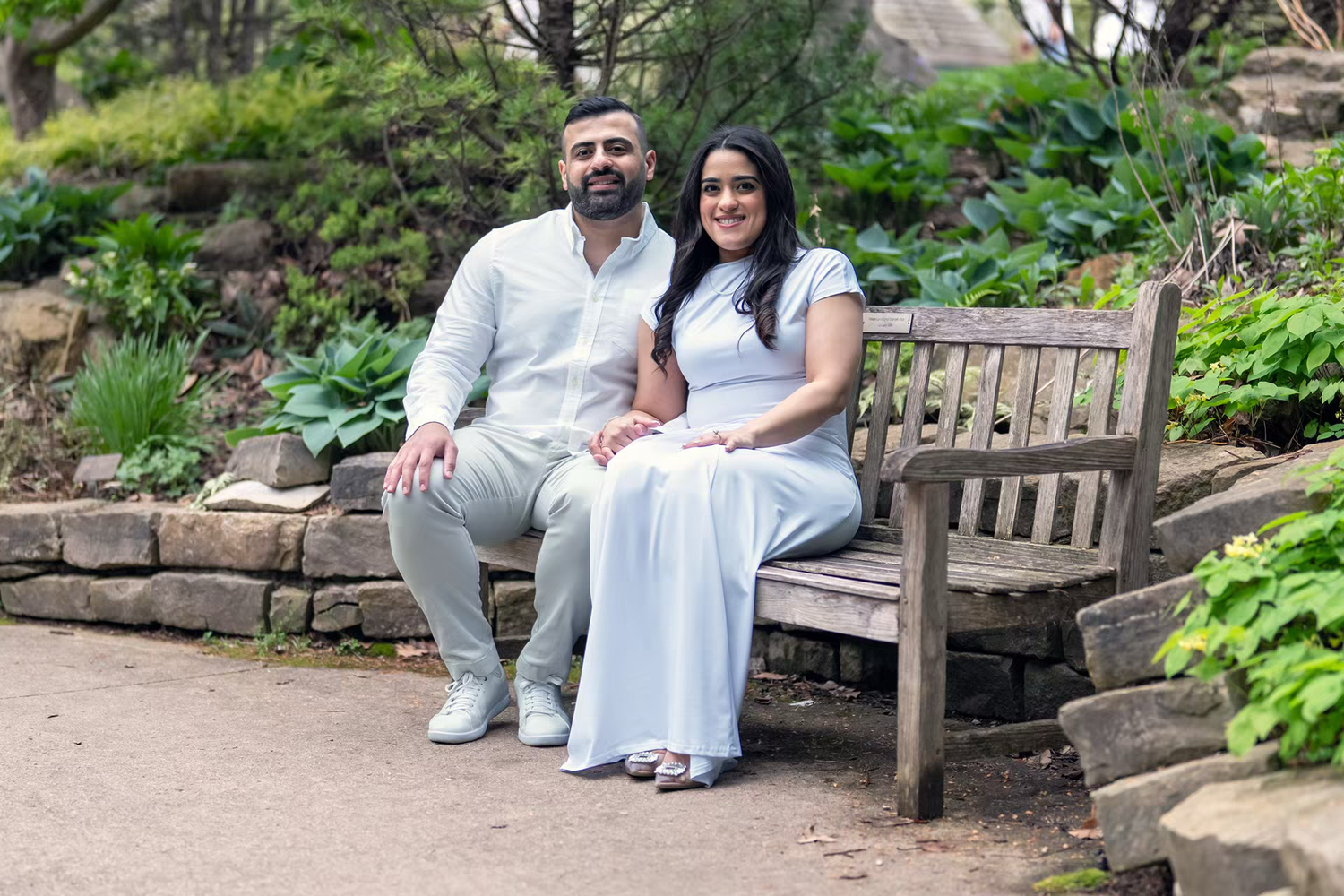 playful engaged Couple in Inniswood Metro Gardens for Engagement Photos