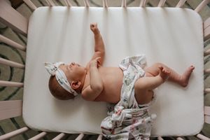 Baby in crib photo Maine
