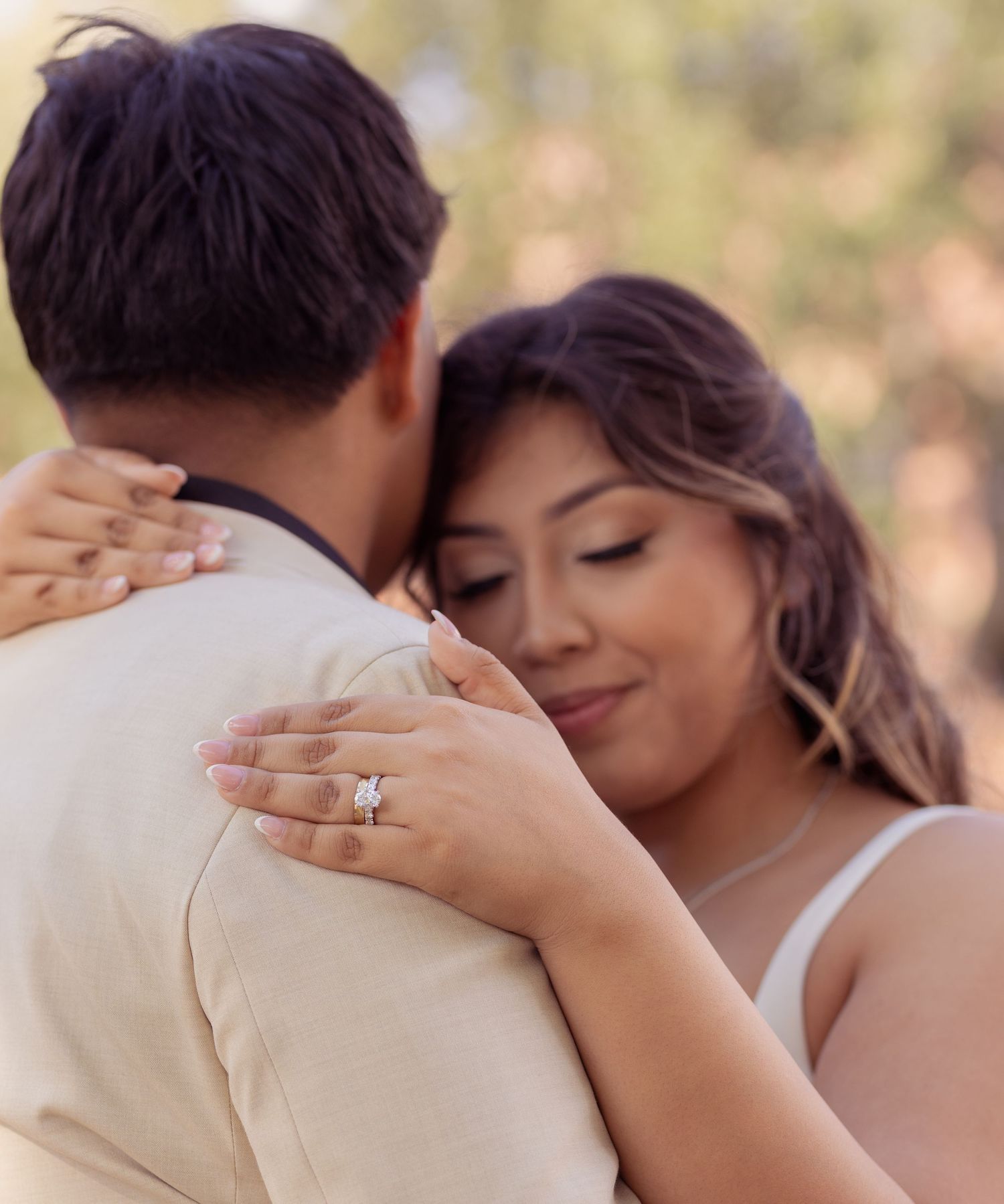 Couple session out in the blue bonnet field holding hands.