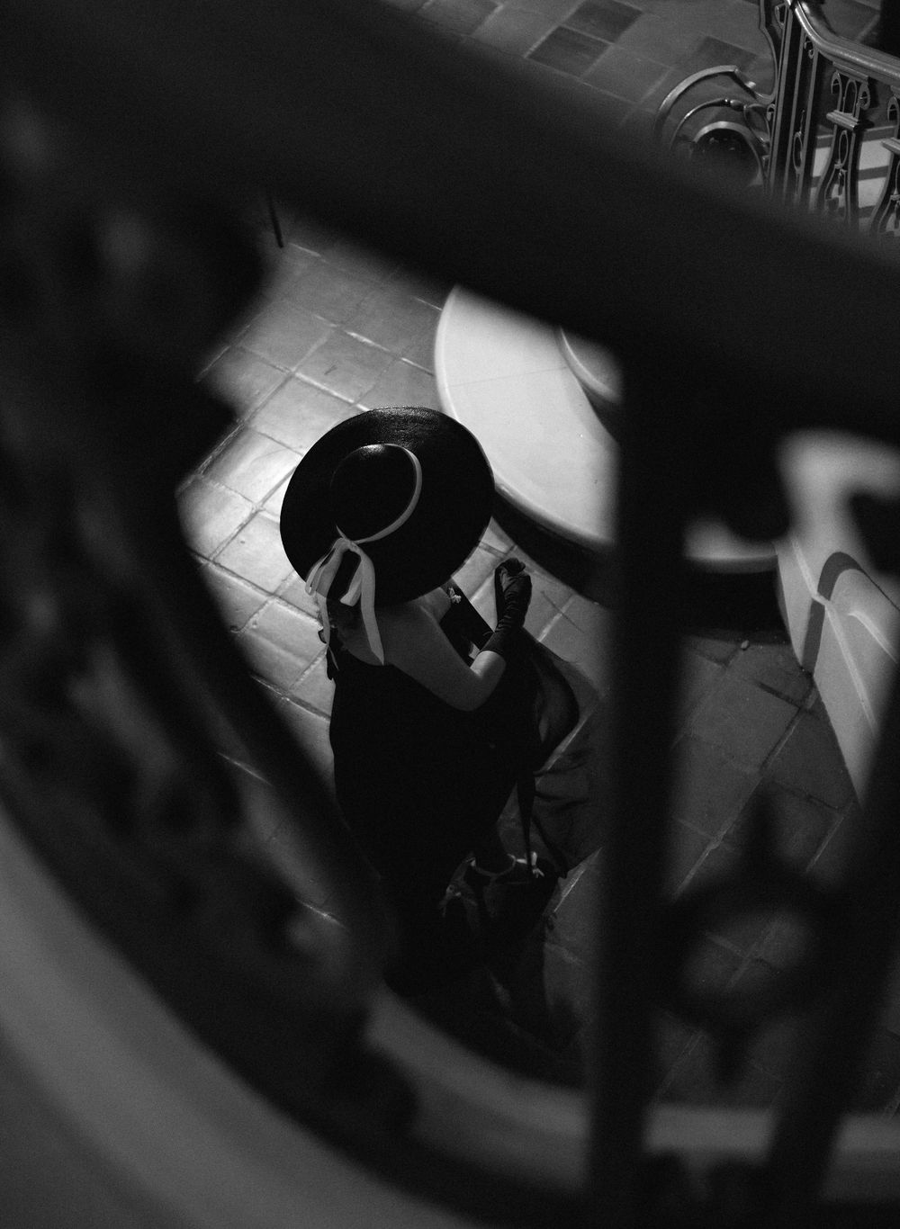 Abstract black and white composition with dramatic shadows and geometric shapes.