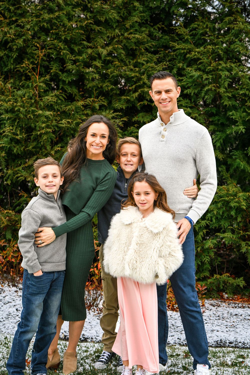 mom, dad, two sons and one daughter in son