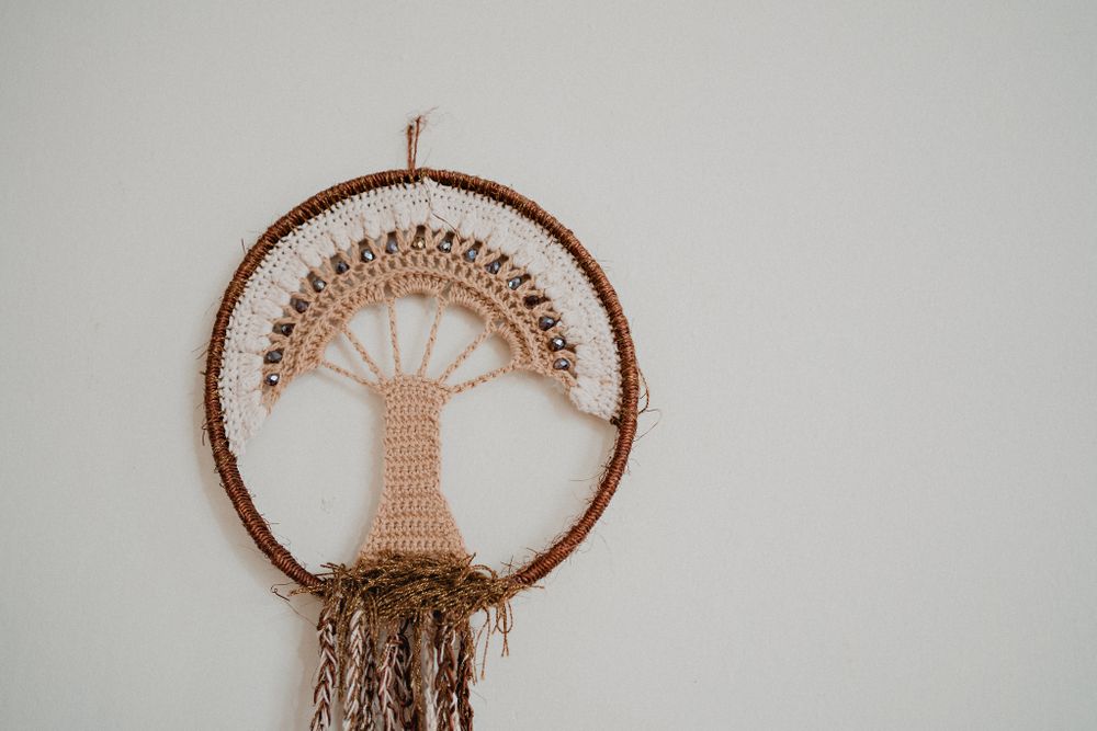 Tree of life ornament inside the house, adding a unique personal touch to the wedding preparations