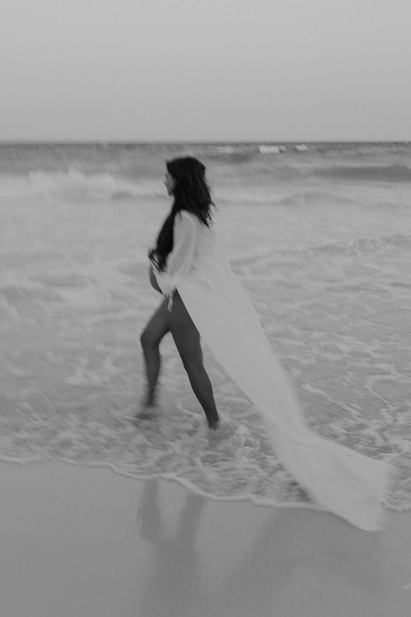 Fine art maternity portrait on the beach in Riviera Maya.