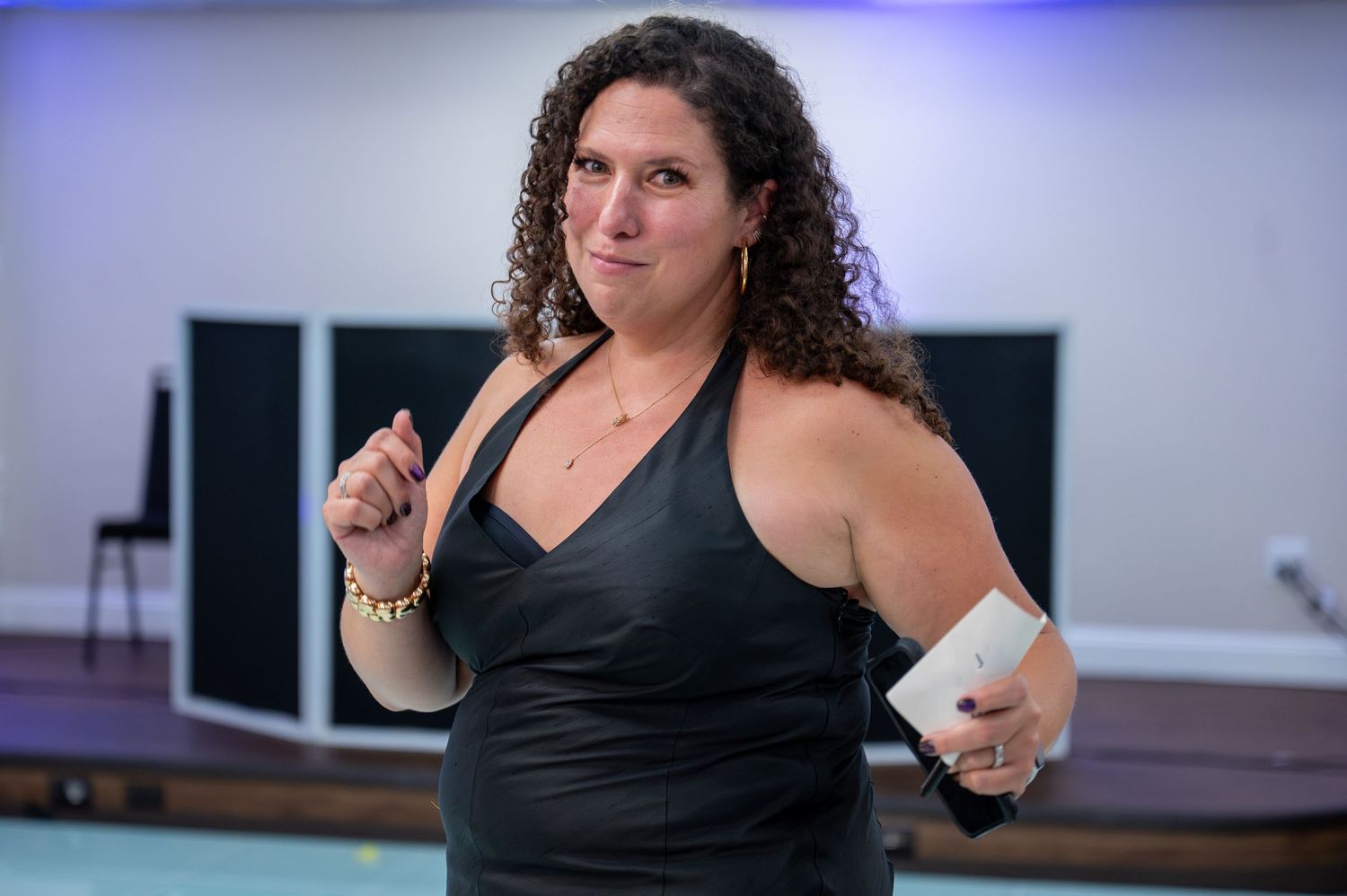 Series of expressive gestures and poses in a professional studio setting.