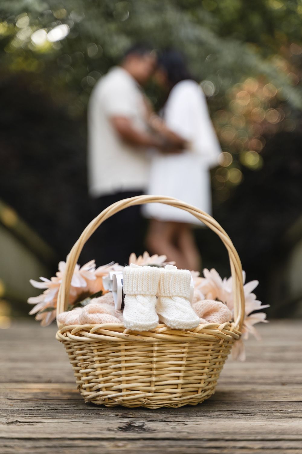 baby shoes in a basket - perfect for an announcement