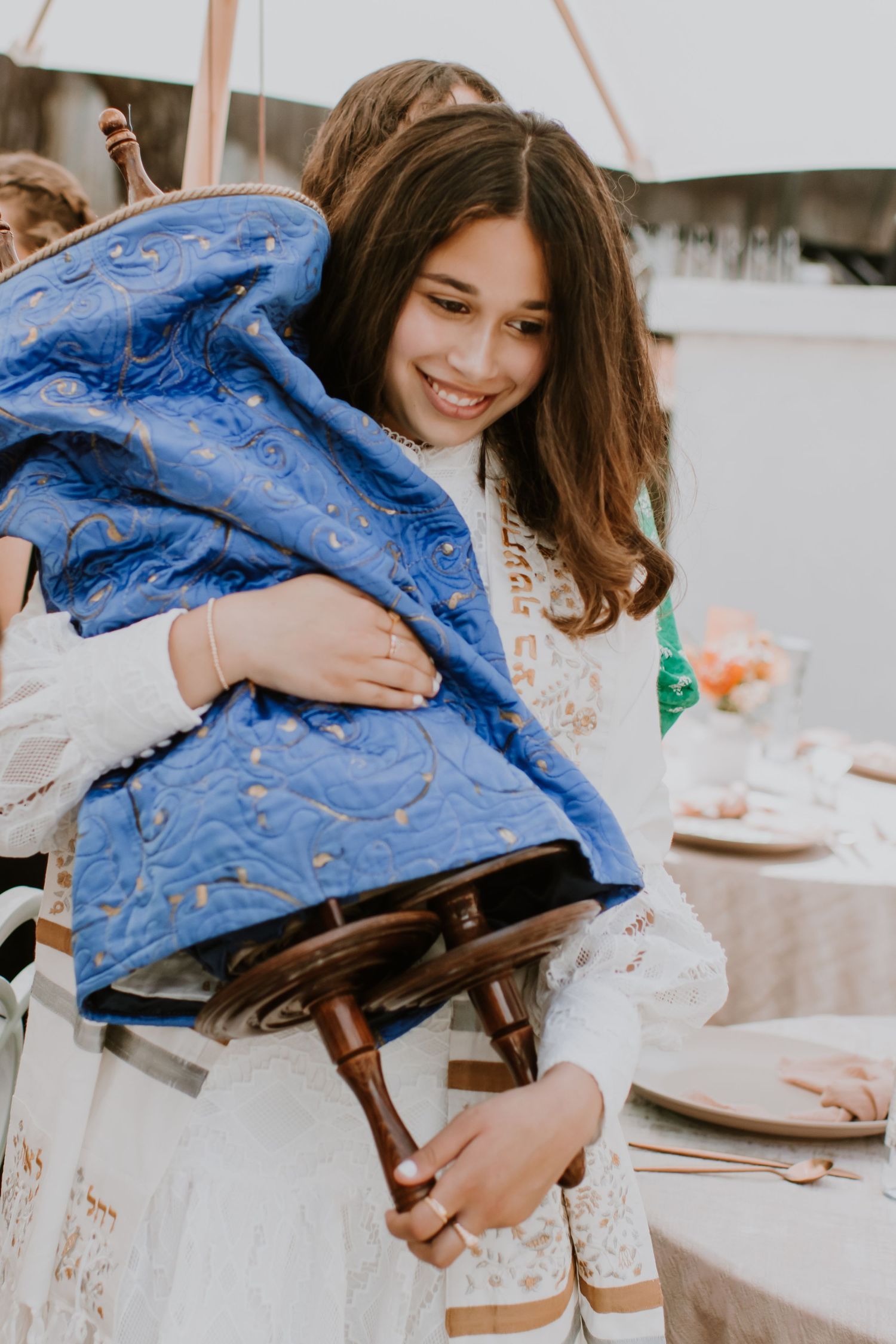 Young girl walking in traditional garments during her Bat Mitzvah in San Diego County