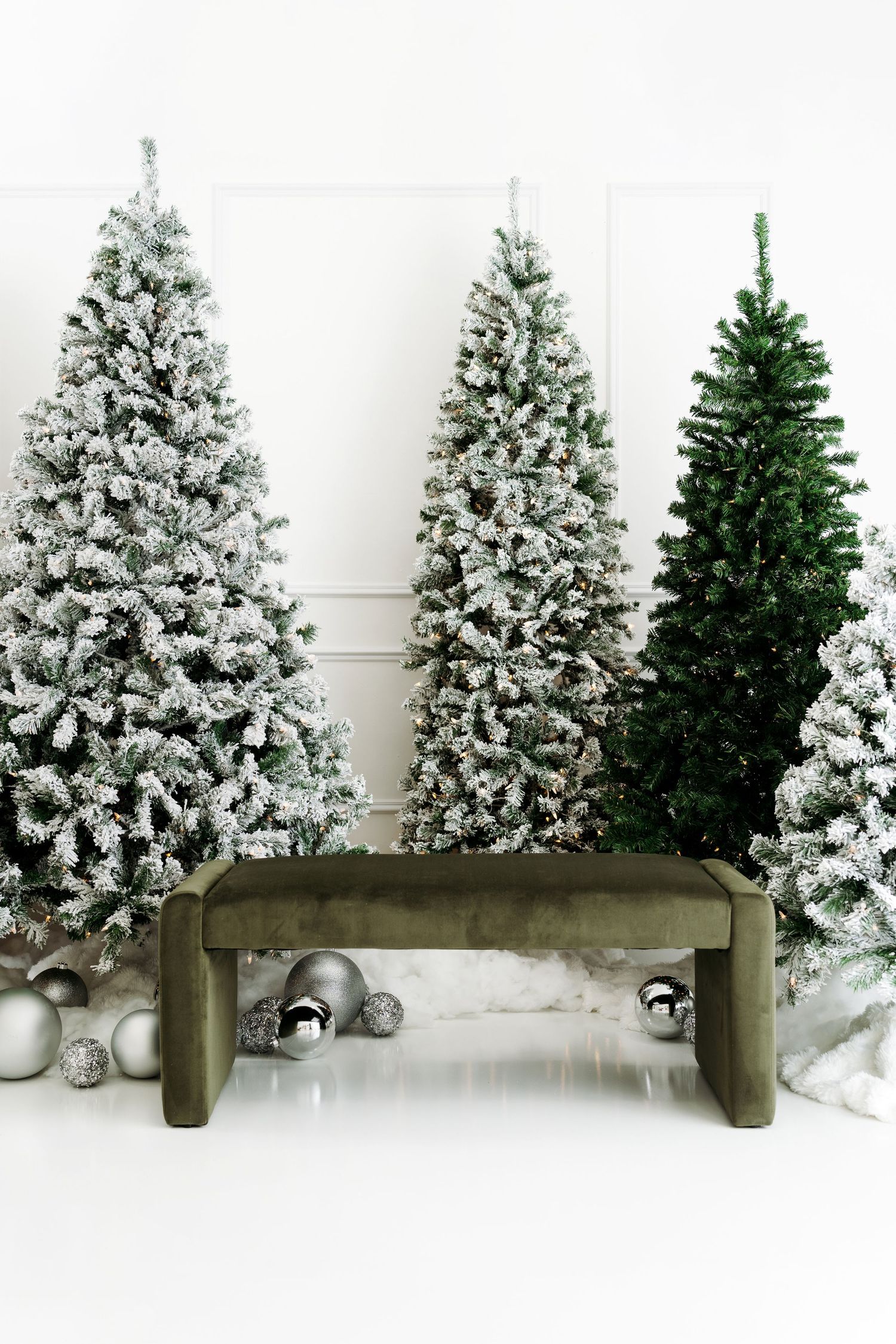 Snowy Chic Holiday Minis studio setup with modern velvet bench and Christmas décor in Houston photo Studio