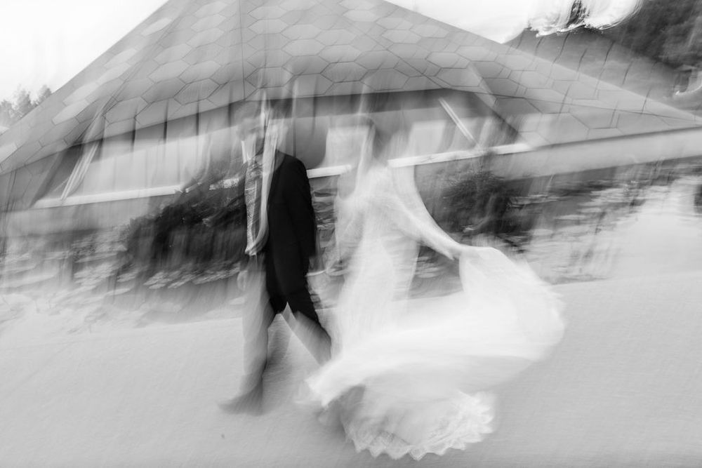 A series of abstract black and white photographs showing blurred motion and movement patterns.