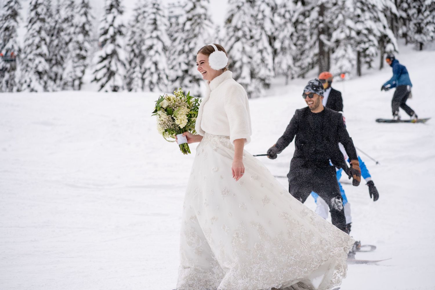 A winter wedding scene with skiers and a flowing white dress against a snowy forest backdrop.