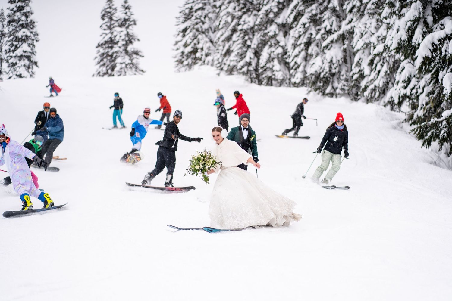 Skiers enjoying a snowy slope with snow-covered evergreen trees in the winter landscape.