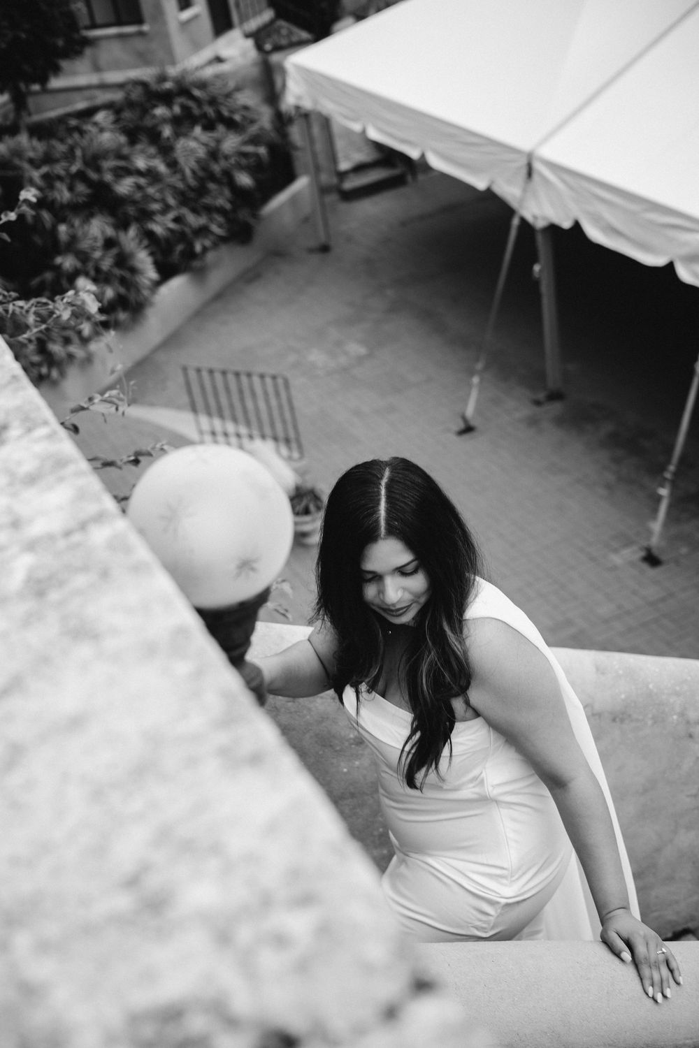 A series of artistic black and white photographs showing movement and motion on a patio setting.