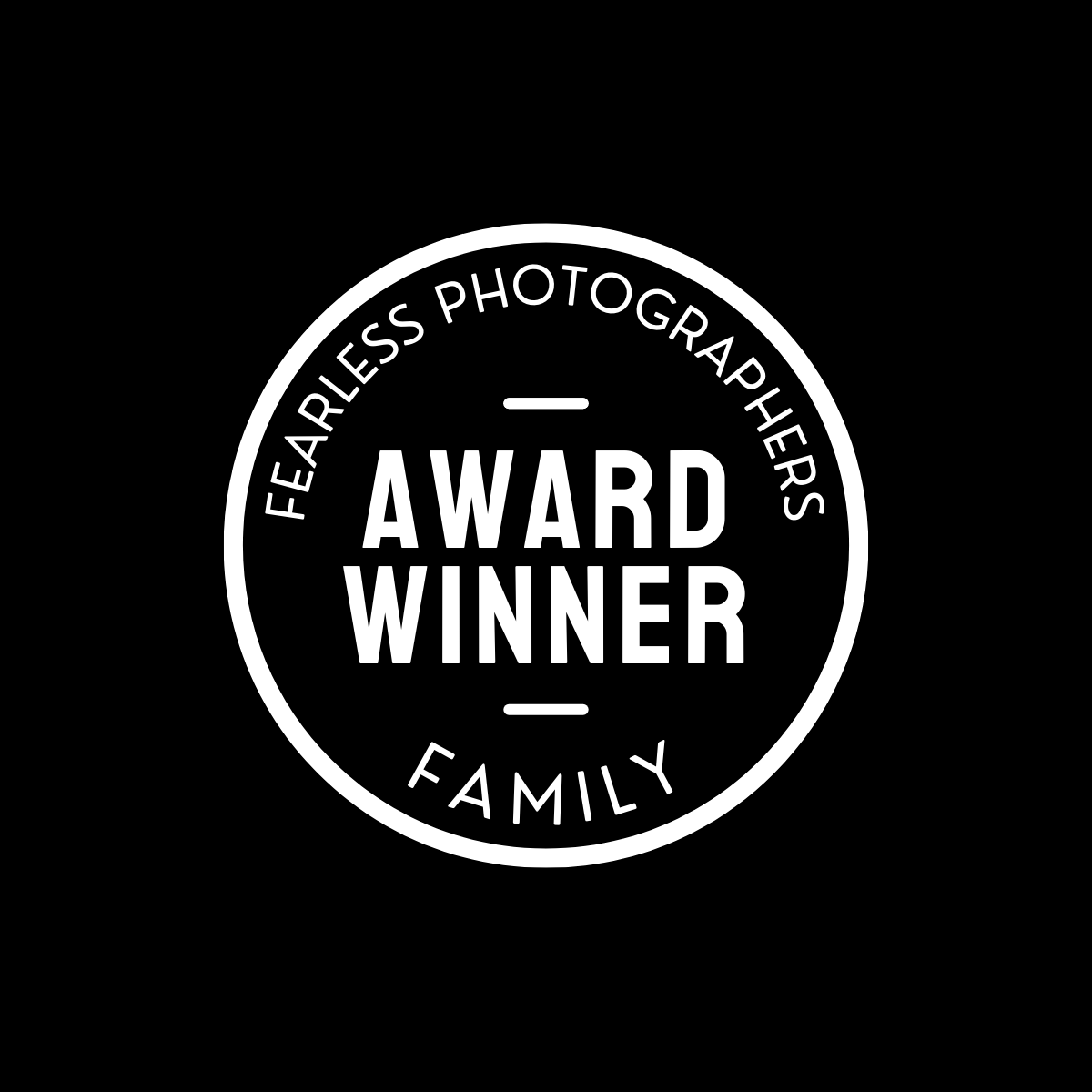 Black and white circular emblem displaying 'Award Winner - Fearless Photographers Family' text.