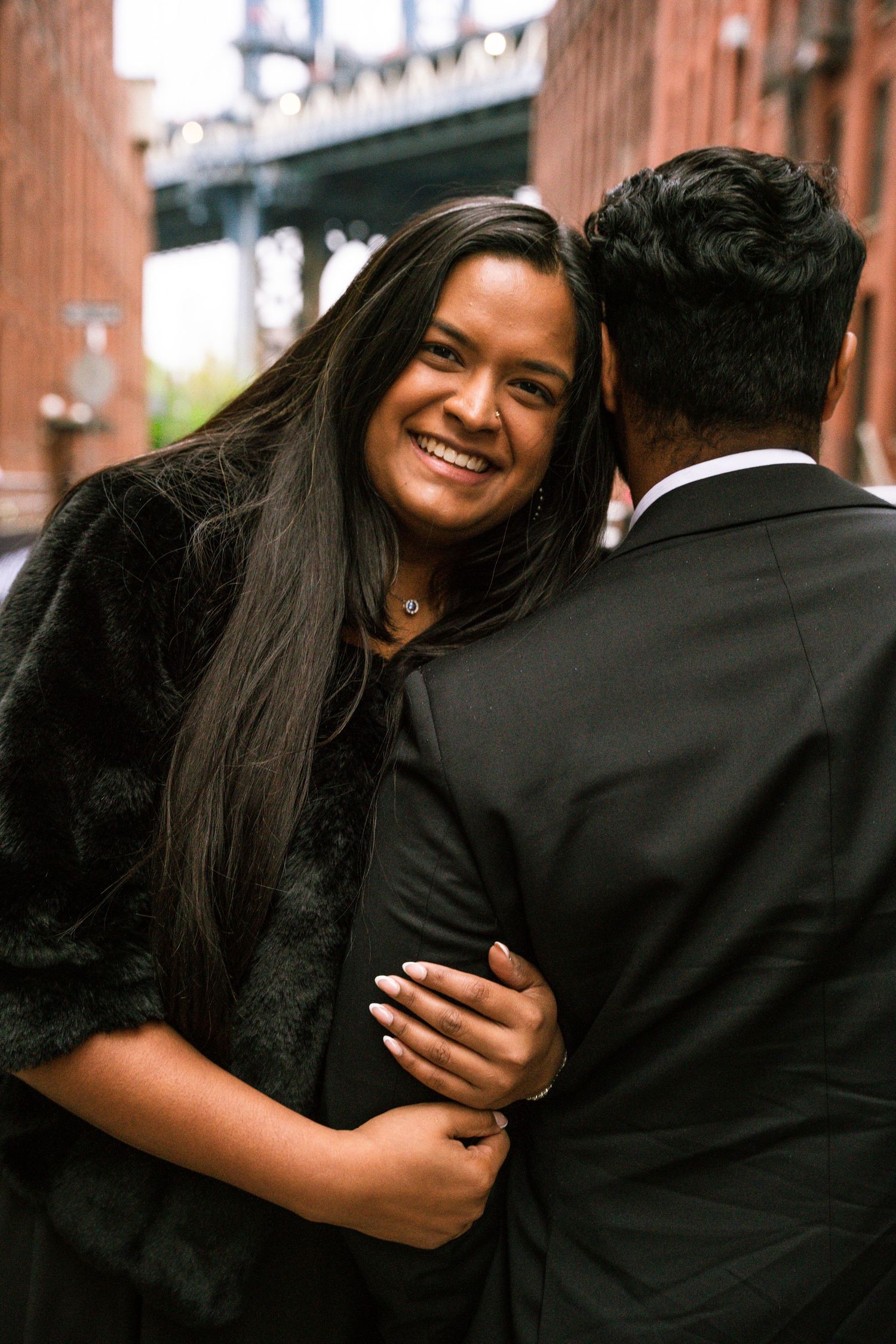 Engagement photography session featuring a couple posing together in New York City