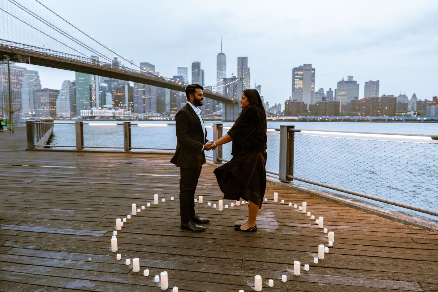 Engagement photography session featuring a couple posing together in New York City