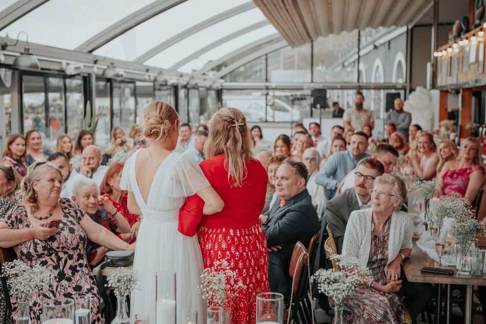 Cornwall wedding photographer captures Wedding guests enjoying an emotional speech during reception at Cornwall wedding