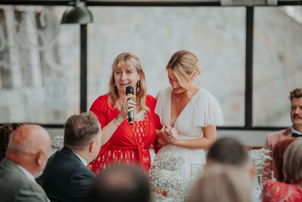 Cornwall wedding photographer captures Wedding guests enjoying an emotional speech during reception at Cornwall wedding
