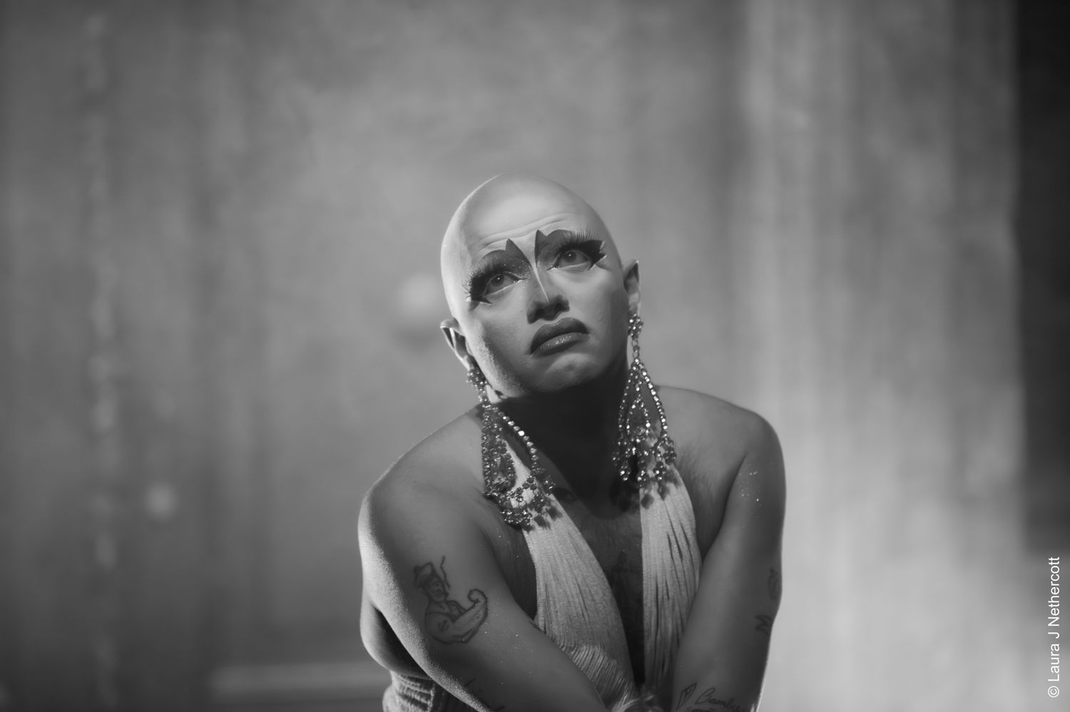 Dramatic black and white portraits showing intense emotional expressions.