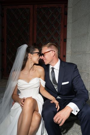 Series of romantic black and white wedding photos showing intimate moments between bride and groom.